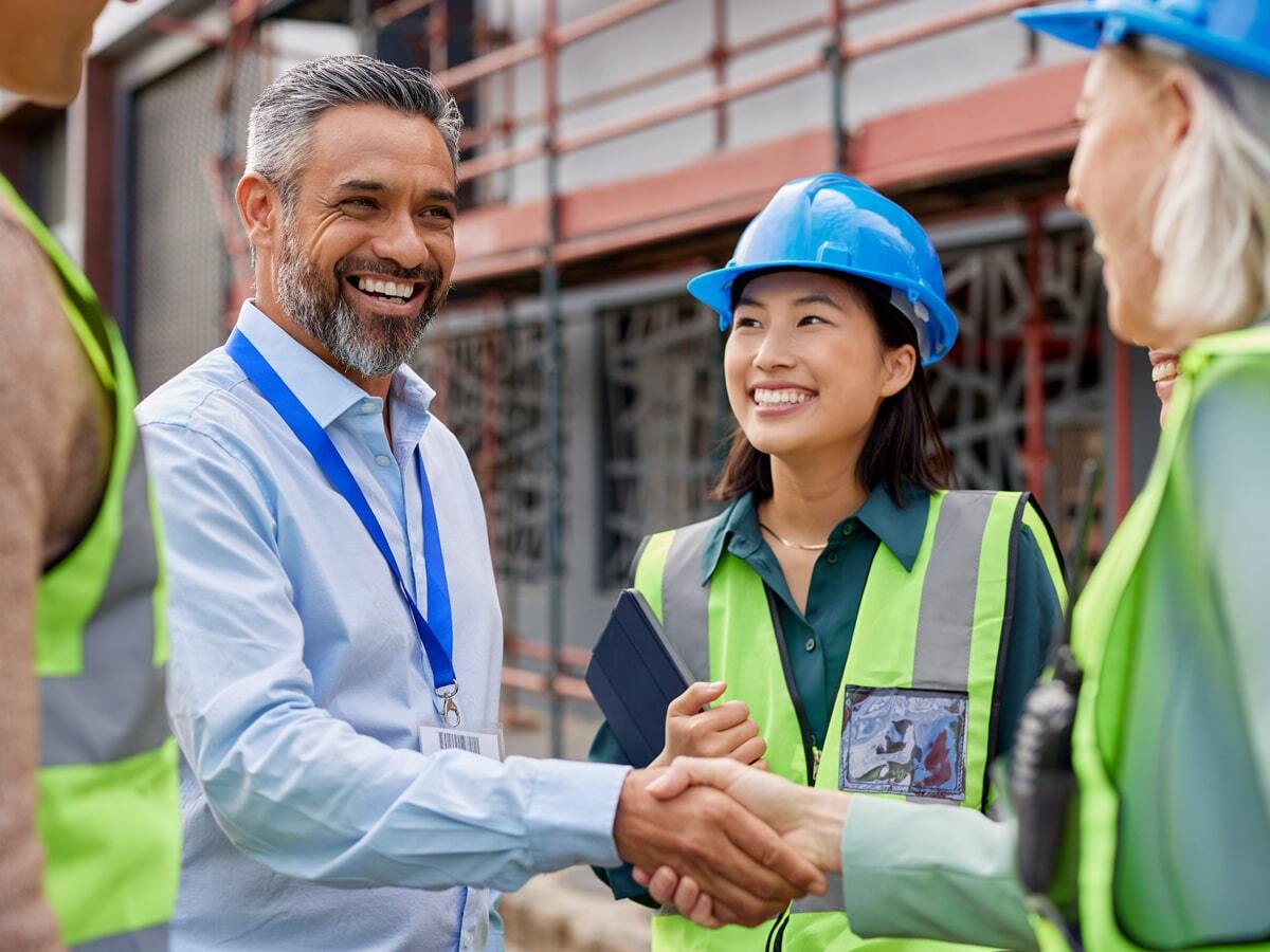 VPO-inset-team-handshake-smiles-min